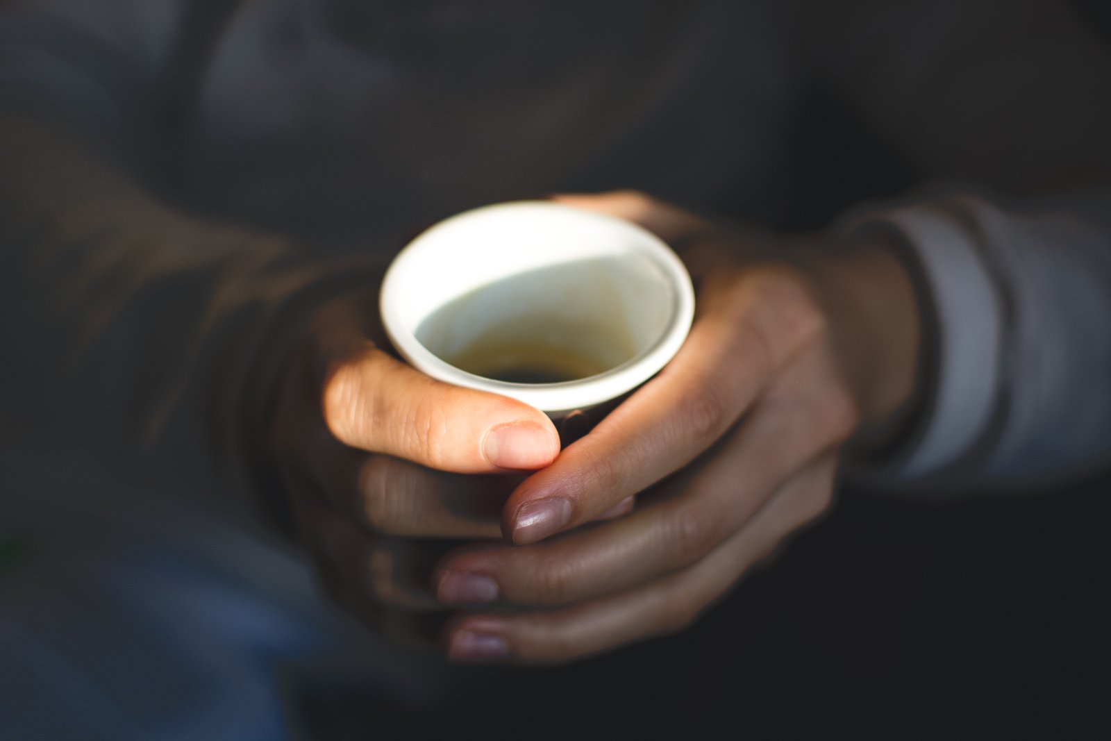 Girl holding coffee espresso