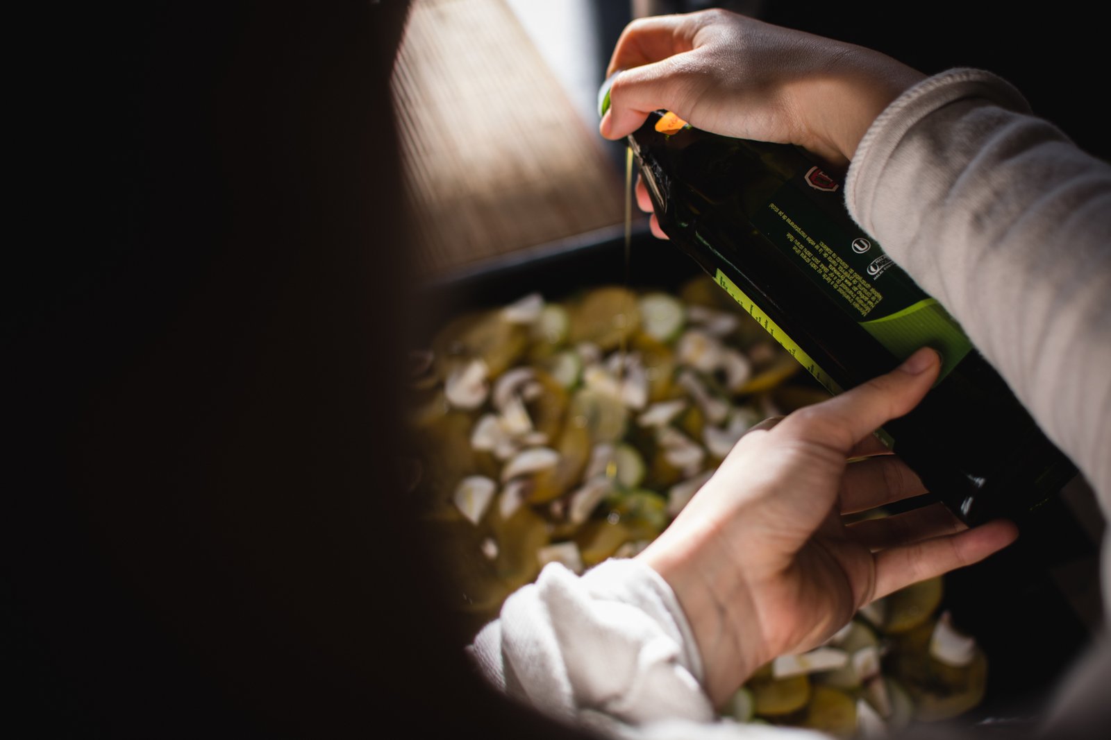 Pouring olive oil