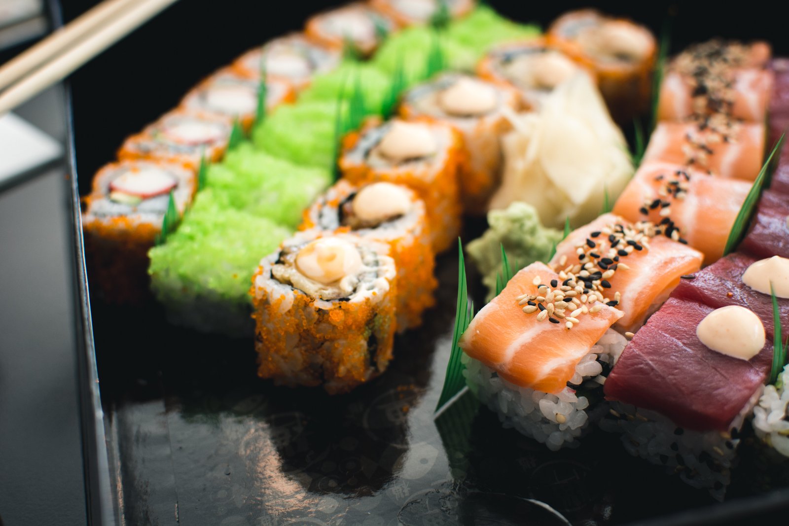 Colorful sushi in a black box